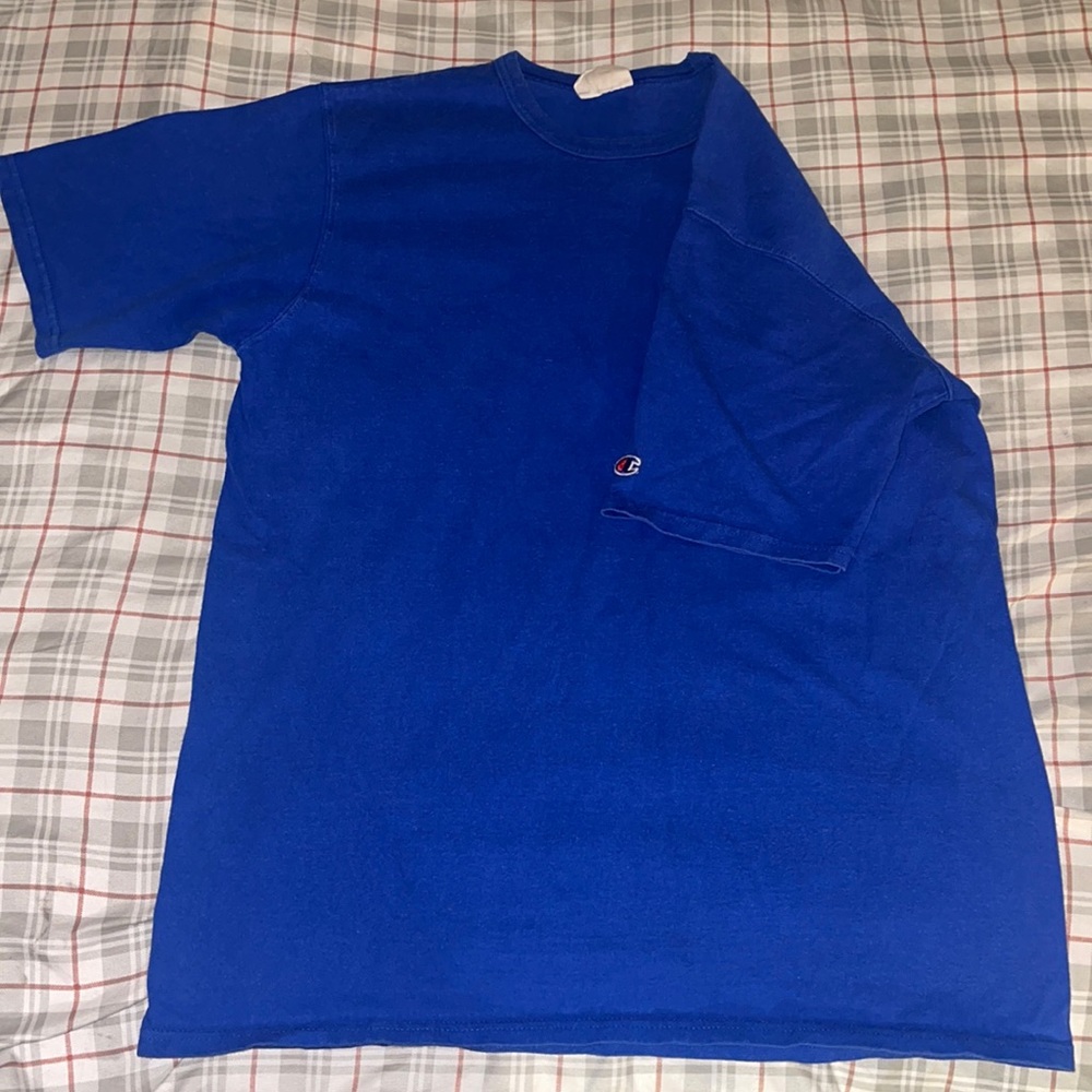 Vintage 1980’s champion solid blue tee. Size XL in men’s.